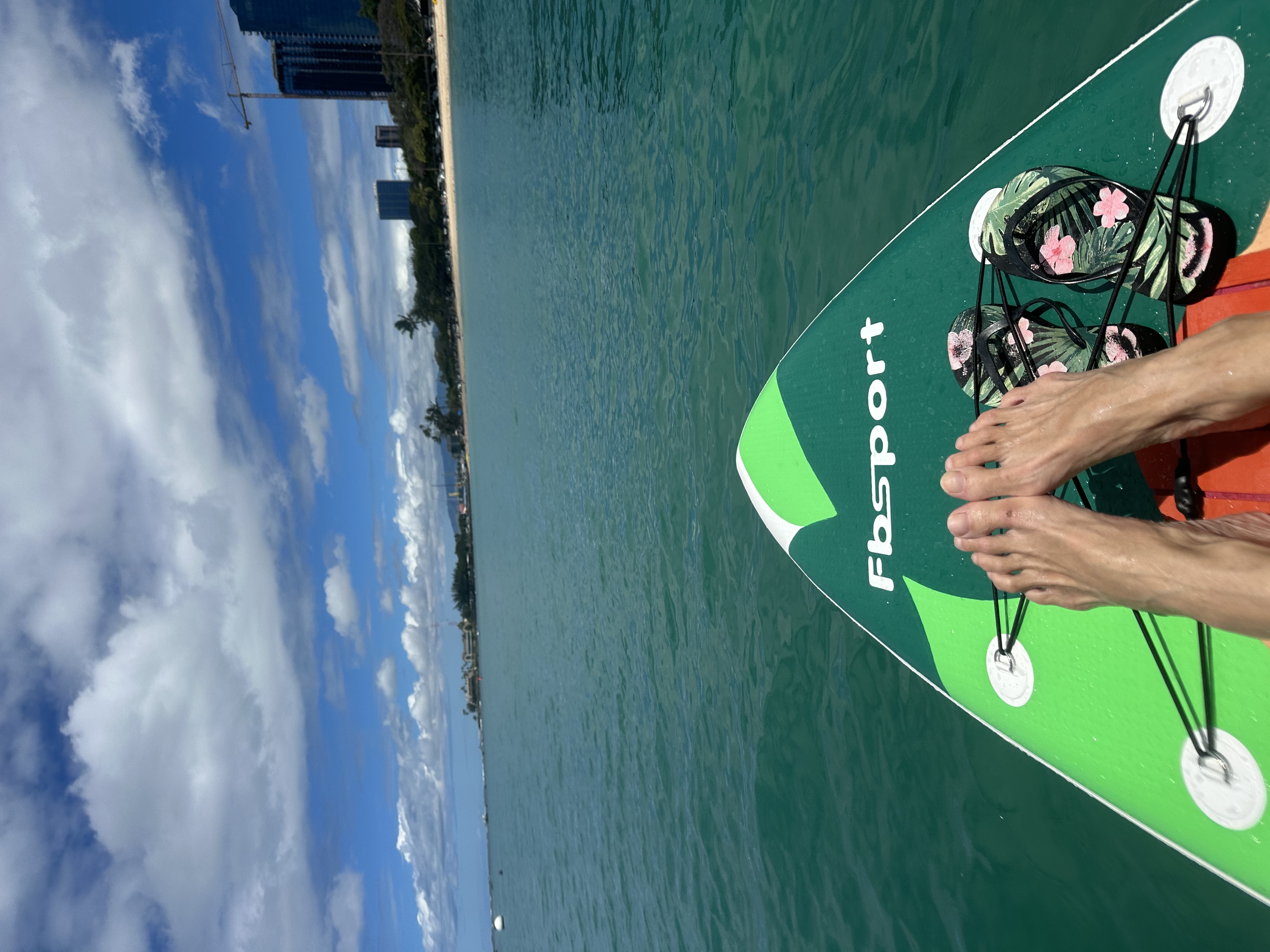 Stand-up paddleboarding on calm turquoise water, Oahu