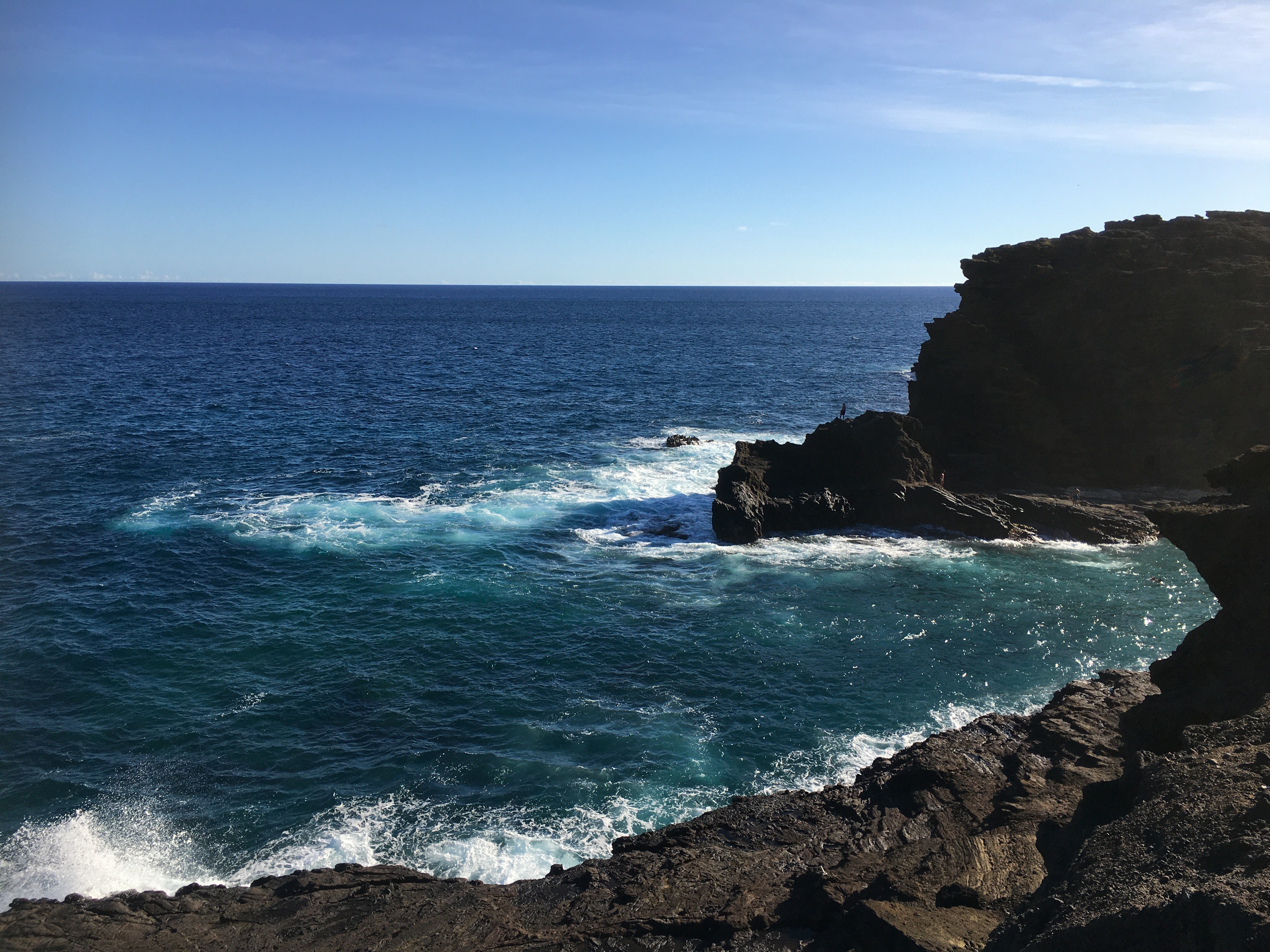 Dramatic lava cliffs and deep blue ocean on Oahu's south shore